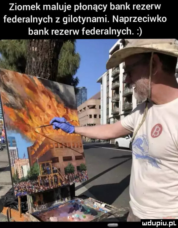 ziomek maluje płonący bank rezerw federalnych z gilotynami. naprzeciwko bank rezerw federalnych. abakankami