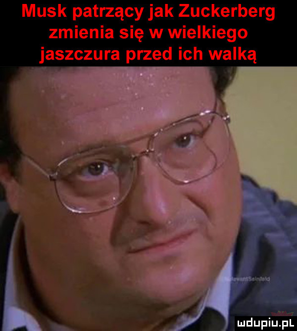 munk patrzący jak zuckerberg zmienia się w wielkiego jaszzura przed ich walką mdupiużfil
