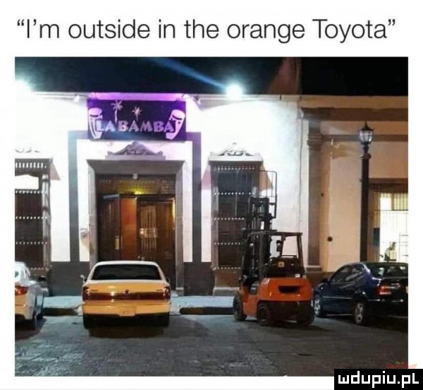 i m outside in tee orange toyota