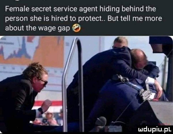 female sekret sernice agent hiking belind tee person sie is hired to protest. but tell me more abort tee wage gap