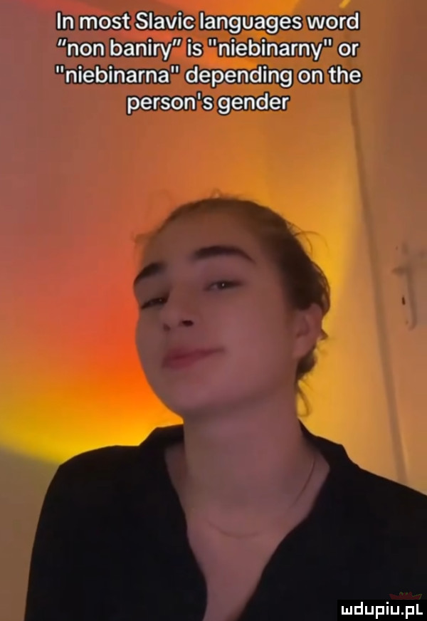 in most slavic languages word non banery is niebinarny or niebinarna depending on tee person s gender